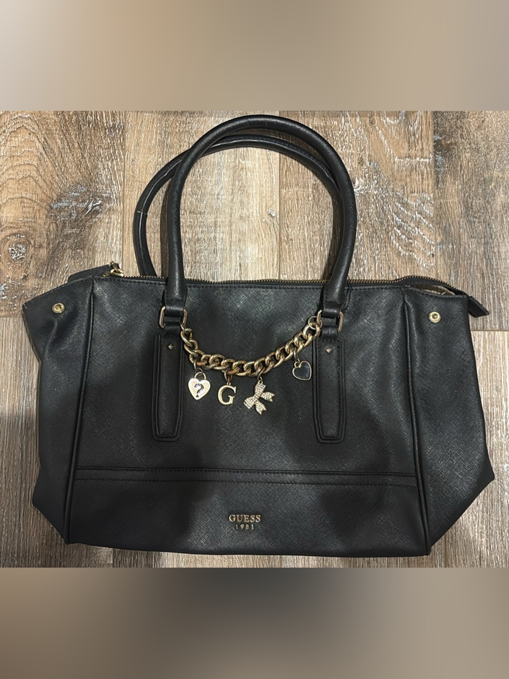GUESS Black Tote with Gold Chain Charm Accents
